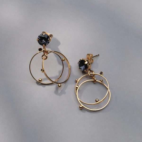 Złocone kolczyki z kryształem w kolorze monatana. GALAKTYCZNY GRANAT