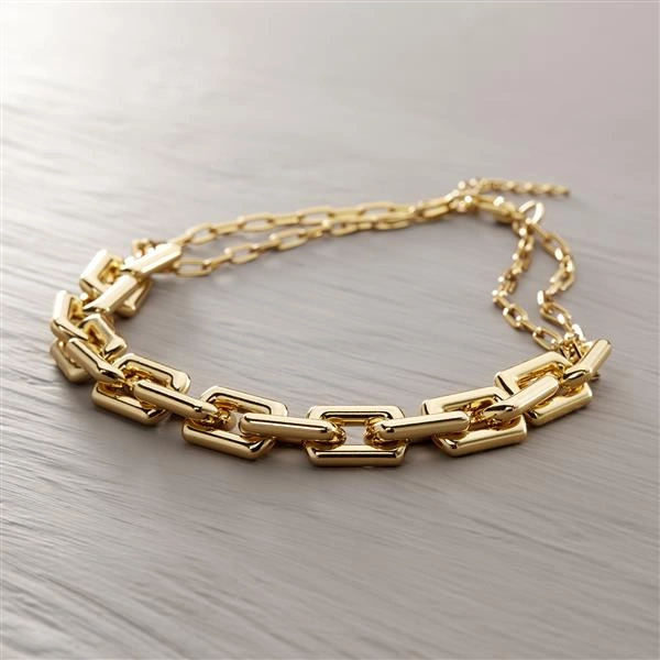 Naszyjnik typu choker z grubego złotego łańcucha. TI AMO