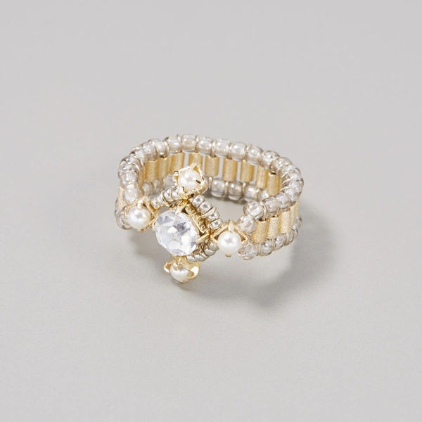 Złoty pierścionek na gumce z perełkami i kryształem. LAMPKA SZAMPANA