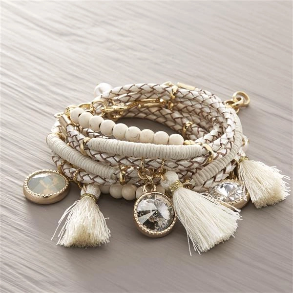 Bransoletka z plecionki z chwostami i kryształami. JASNA SPRAWA